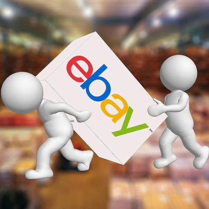 Two white figures holding an eBay logo against a blurred indoor background, links to ebay storefront 